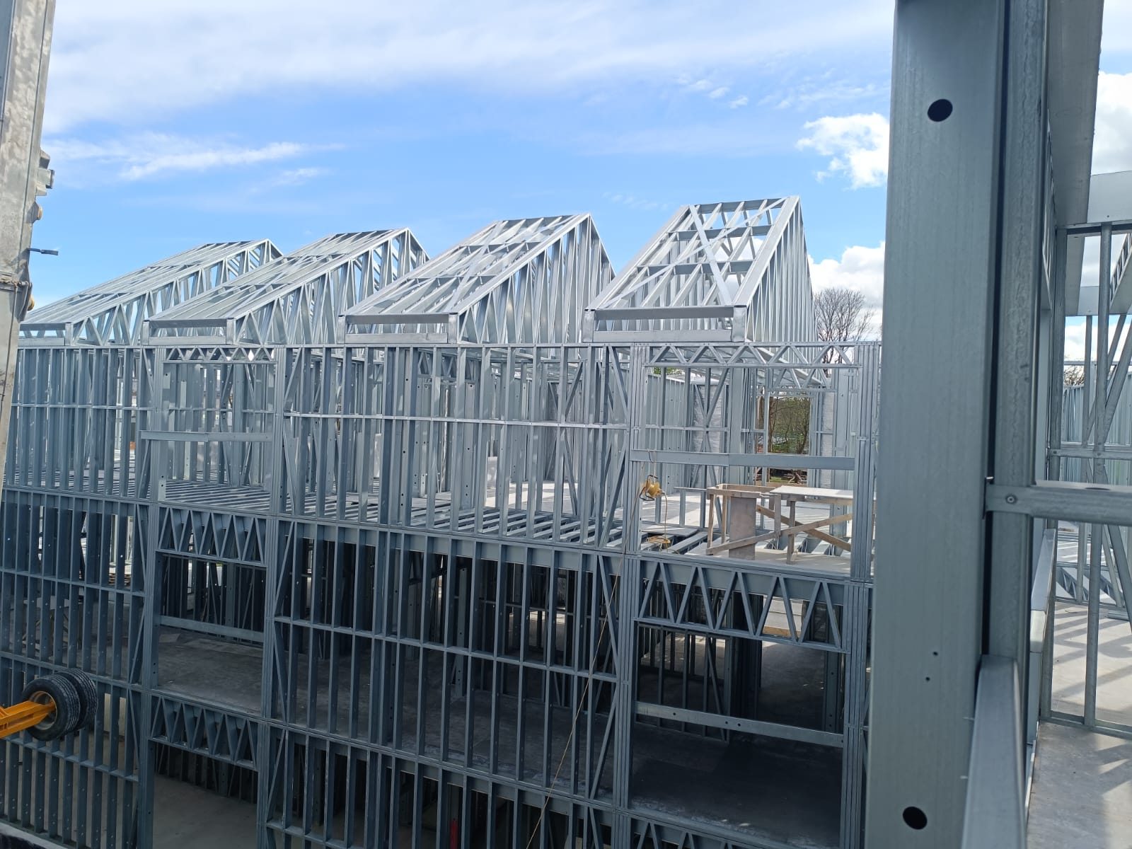 Light steel frame walls and roof trusses on site